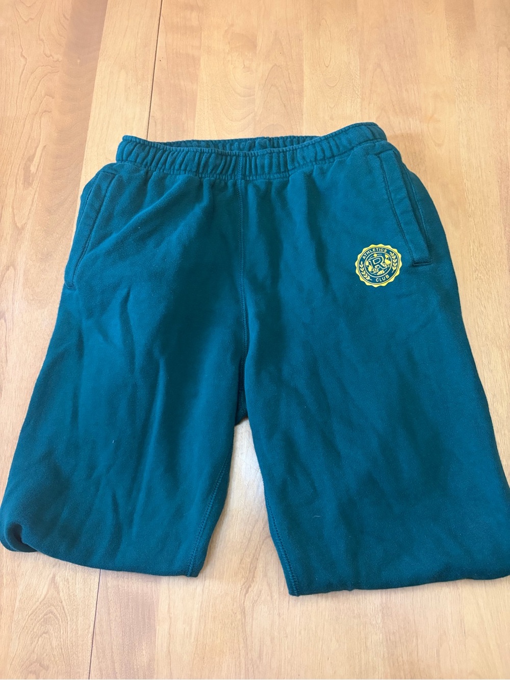 Roots green joggers with Yellow Crest
